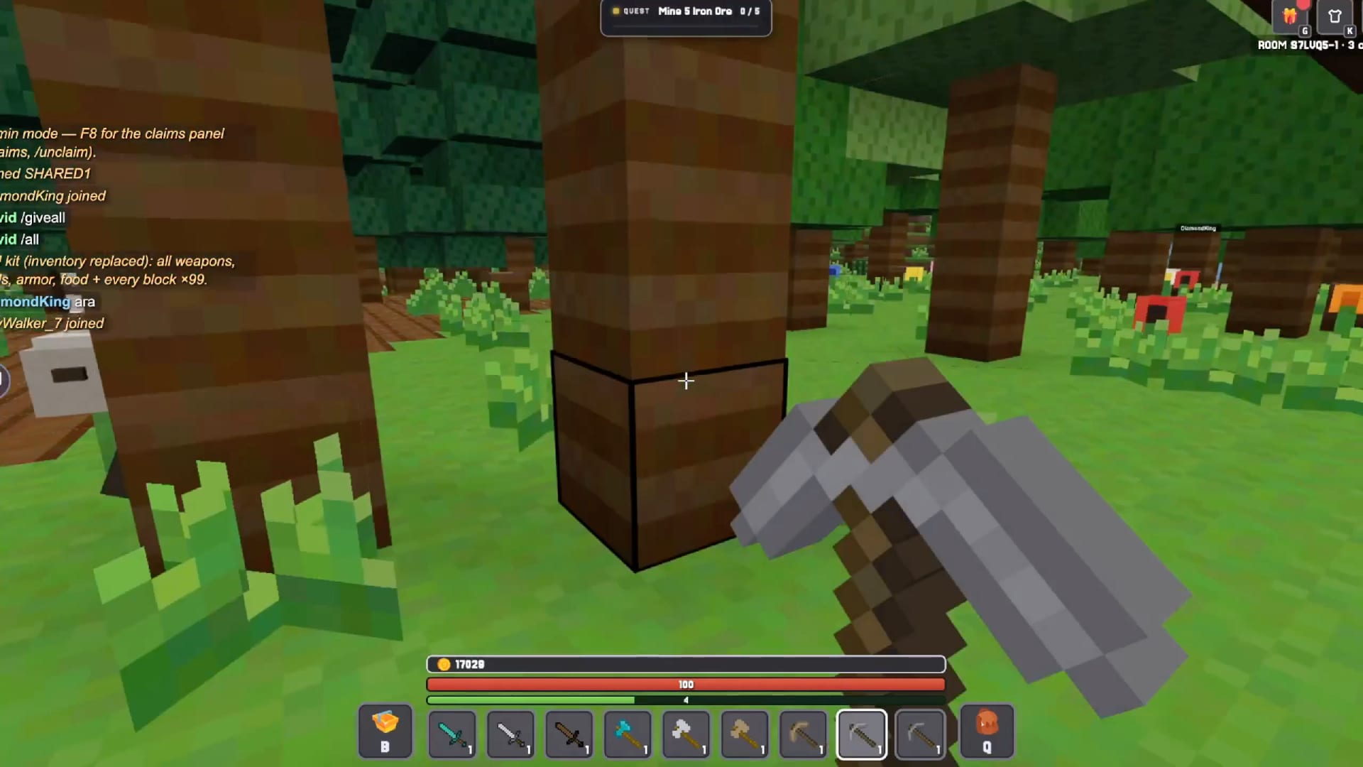 Kubz.io — first-person view holding a stone pickaxe in a blocky forest, ready to mine and gather wood.